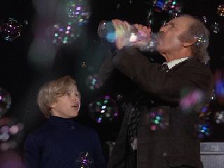 Grandpa Joe enjoys a nice belt from a stolen beverage.