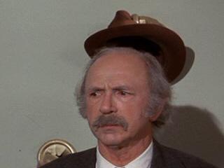 Grandpa Joe's hat is taken by the thoughtful coatrack.